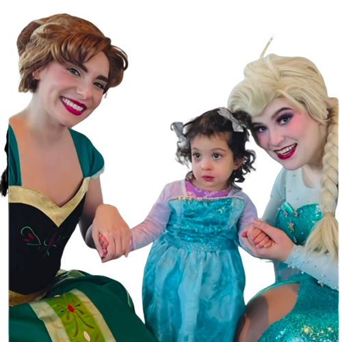 Two women dressed as princesses holding hands with a little girl in a blue dress.