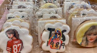 Decorated cookies with colorful icing and the numbers '1989'.