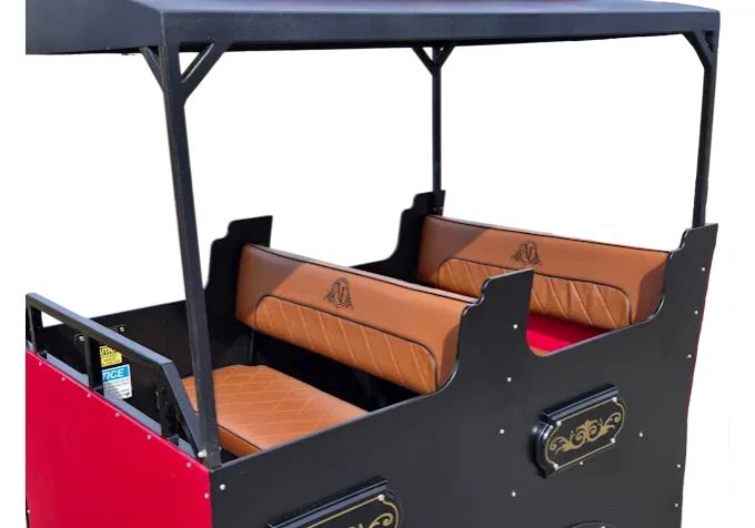 Red and black carriage with leather seats.